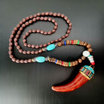 A bohemian style beautiful handmade tooth necklace for boys and girls. A Unique Gift