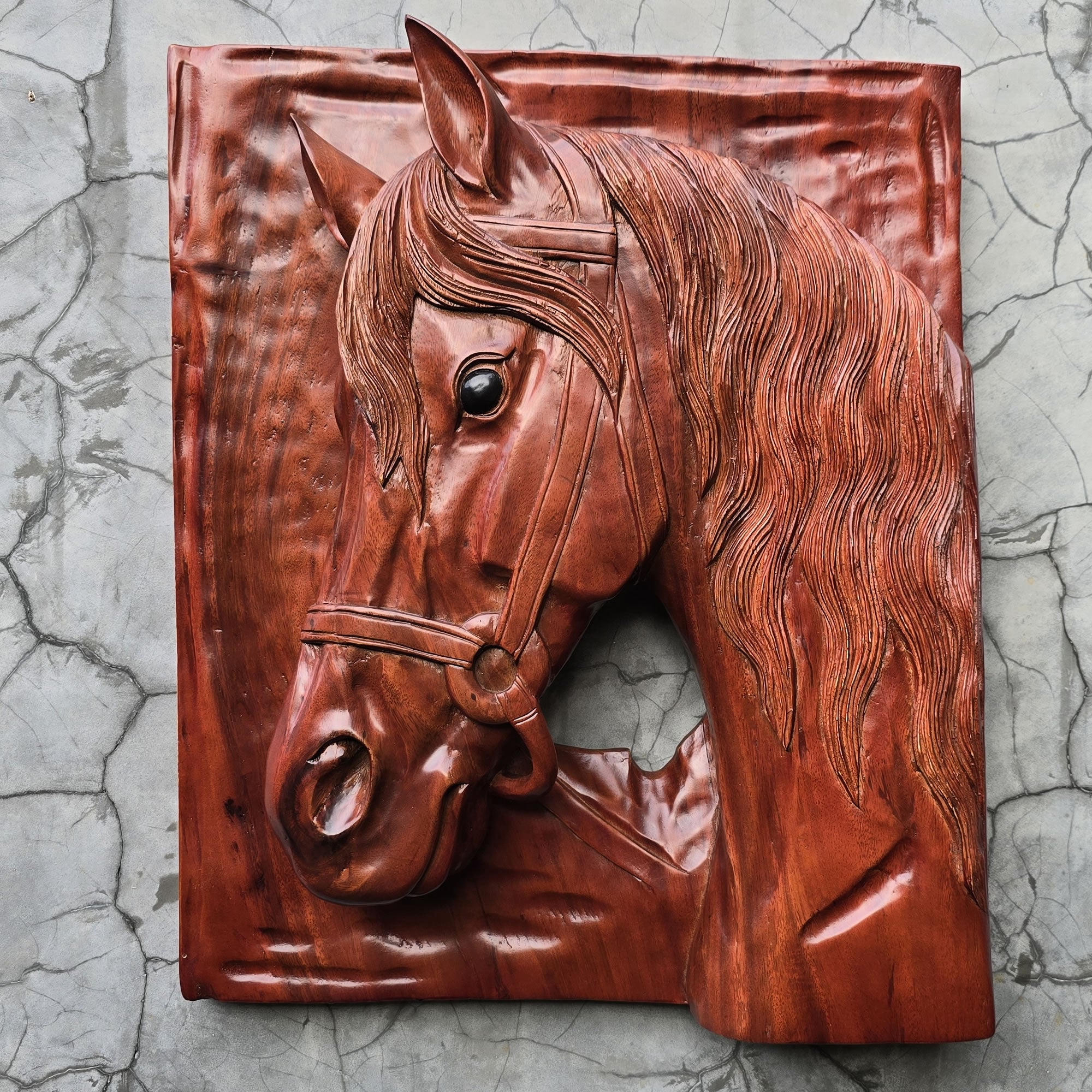 Elevate your space with a large-scale hand-carved teakwood stallion. A powerful 3D horse wall relief for luxury home and office decor. Bespoke artisan craftsmanship.