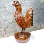 This stunning large hand-carved teakwood decorative Rooster Chicken sculpture is quite impressive and unique.
