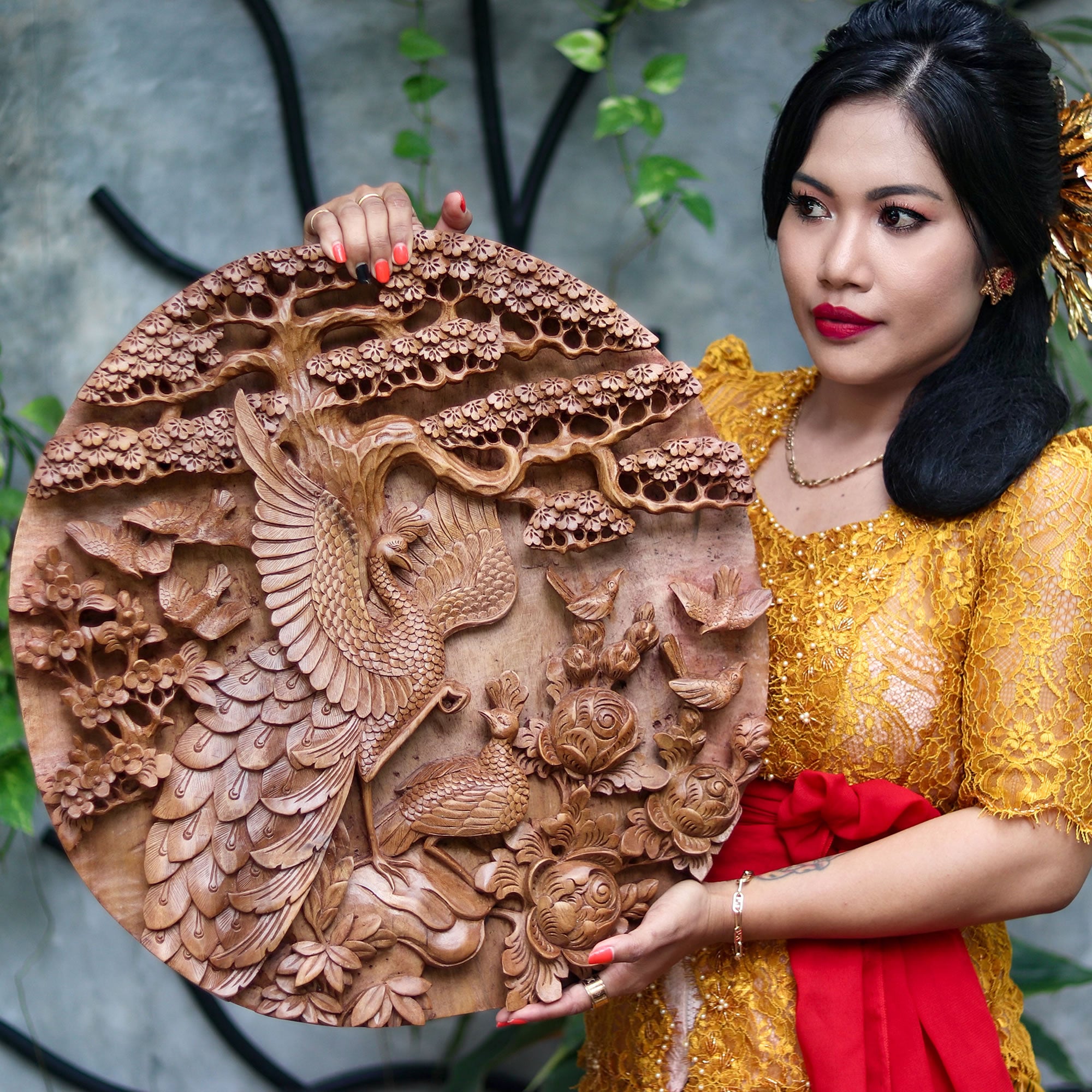 This is a stunning masterpiece. Intricately detailed decorative wall art hand-carved Peacock birds out of Teak Wood.