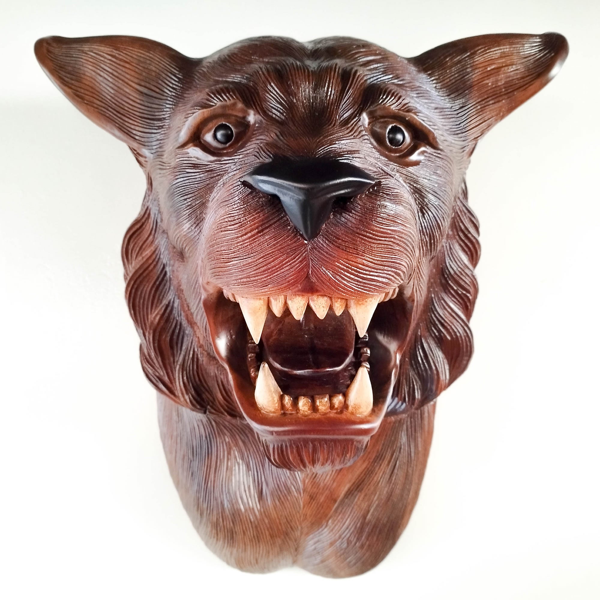 This stunning large hand-carved teakwood decorative African Tiger Lion head wall sculpture is simply amazing. Carved out of solid wood by hand with intricate details. This certainly will be an eye-catching feature in any room and a talking point.
