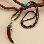 A bohemian style beautiful handmade tooth necklace for boys and girls. A Unique Gift