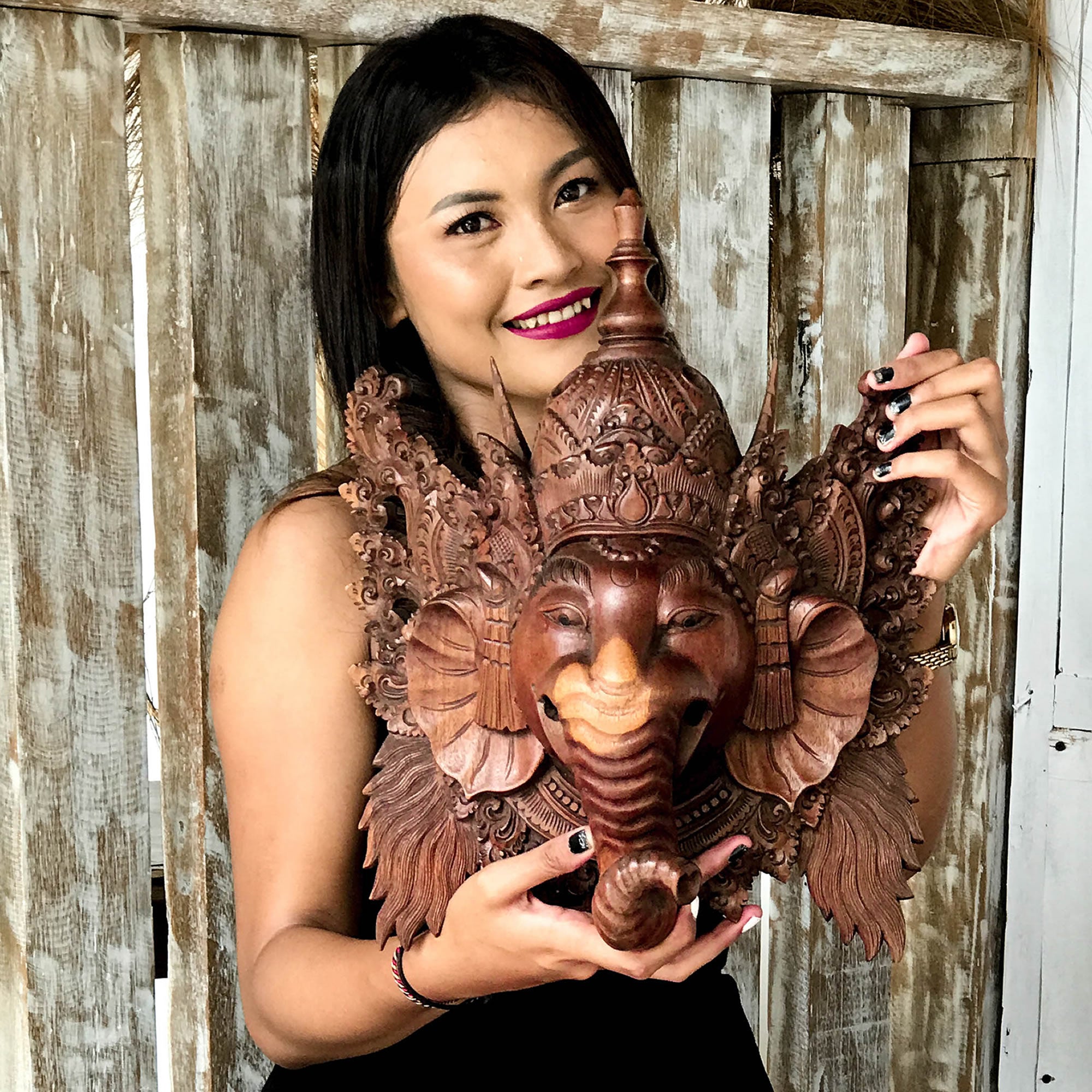 A beautiful, versatile hand-carved teakwood Ganesha sculpture. Perfect for home offices, small Mandirs, or as a meaningful spiritual gift. Handcrafted 3D wall art.