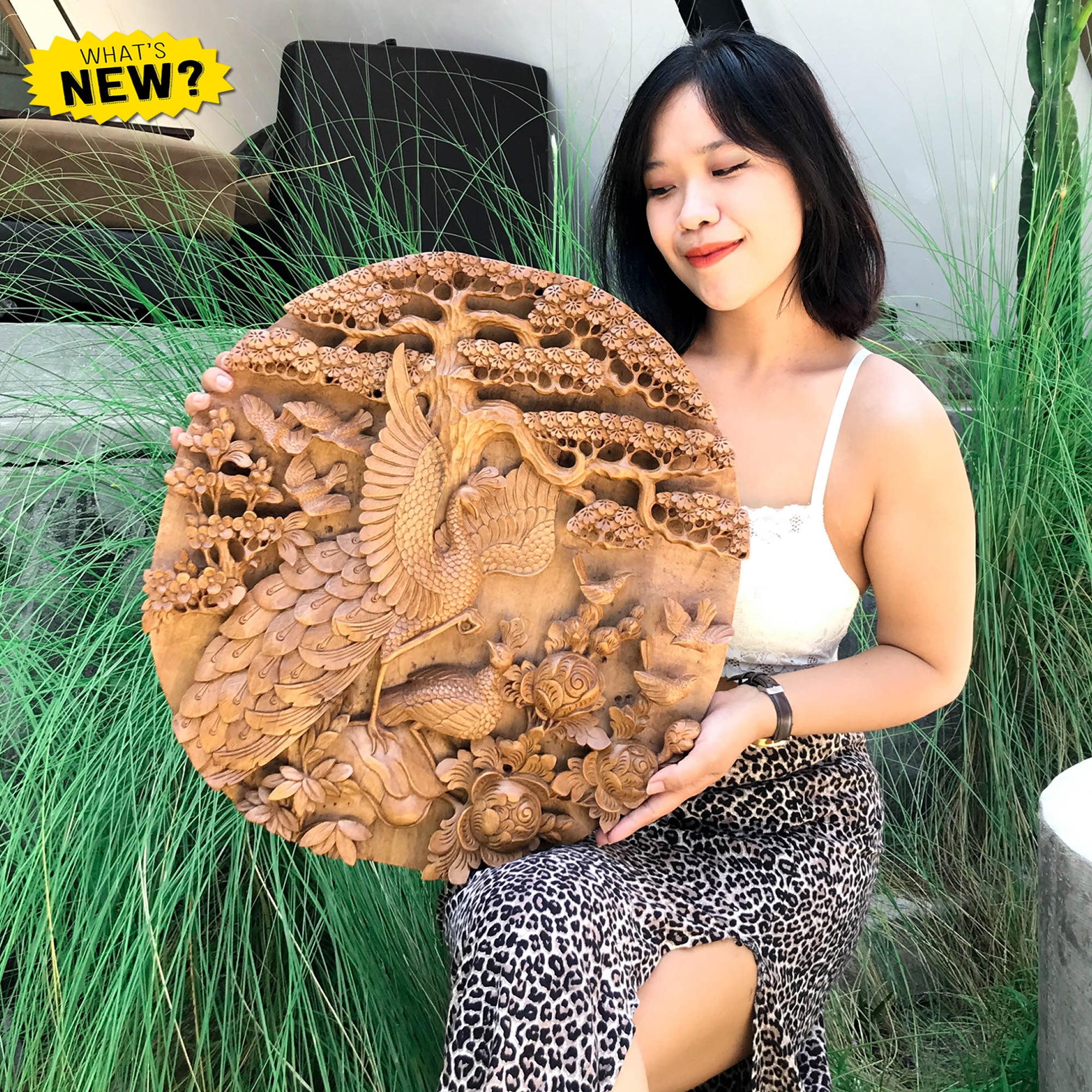 This is a stunning masterpiece. Intricately detailed decorative wall art hand-carved Peacock birds out of Teak Wood.