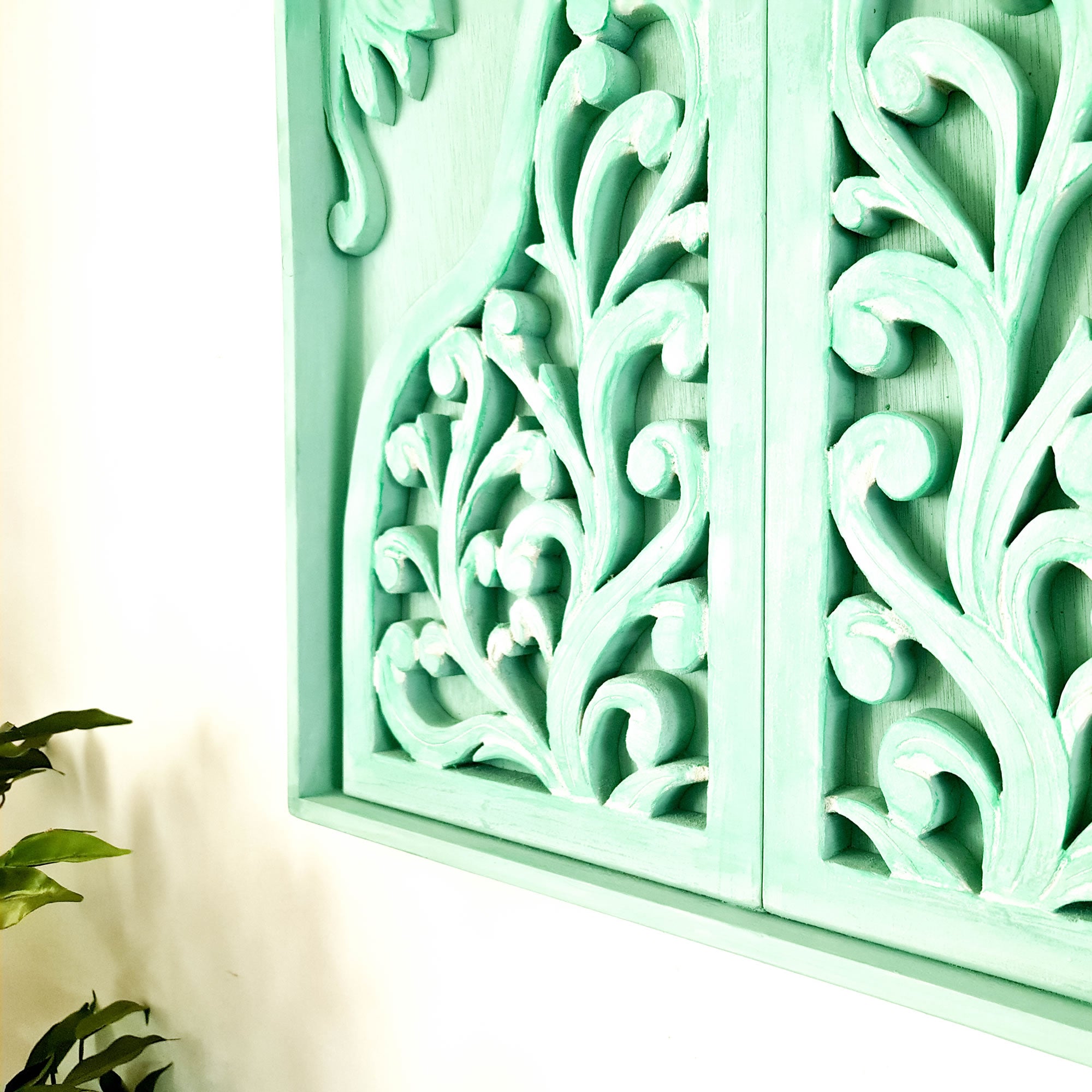 Truly remarkable, this unique piece of Carved Wooden Wall Art is handcrafted and hand-painted, yielding eye-catching results. This Wall Art is sure to make a striking statement in any décor. Bohemian-styled distressed wall art.