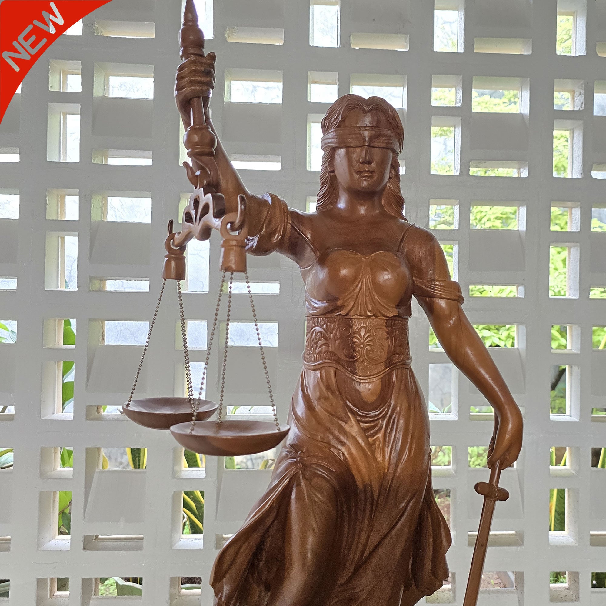 Hand-carved out of solid teakwood, this Lady Justice Greek Goddess sculpture is unique and rare.
