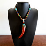 A bohemian style beautiful handmade tooth necklace for boys and girls. A Unique Gift