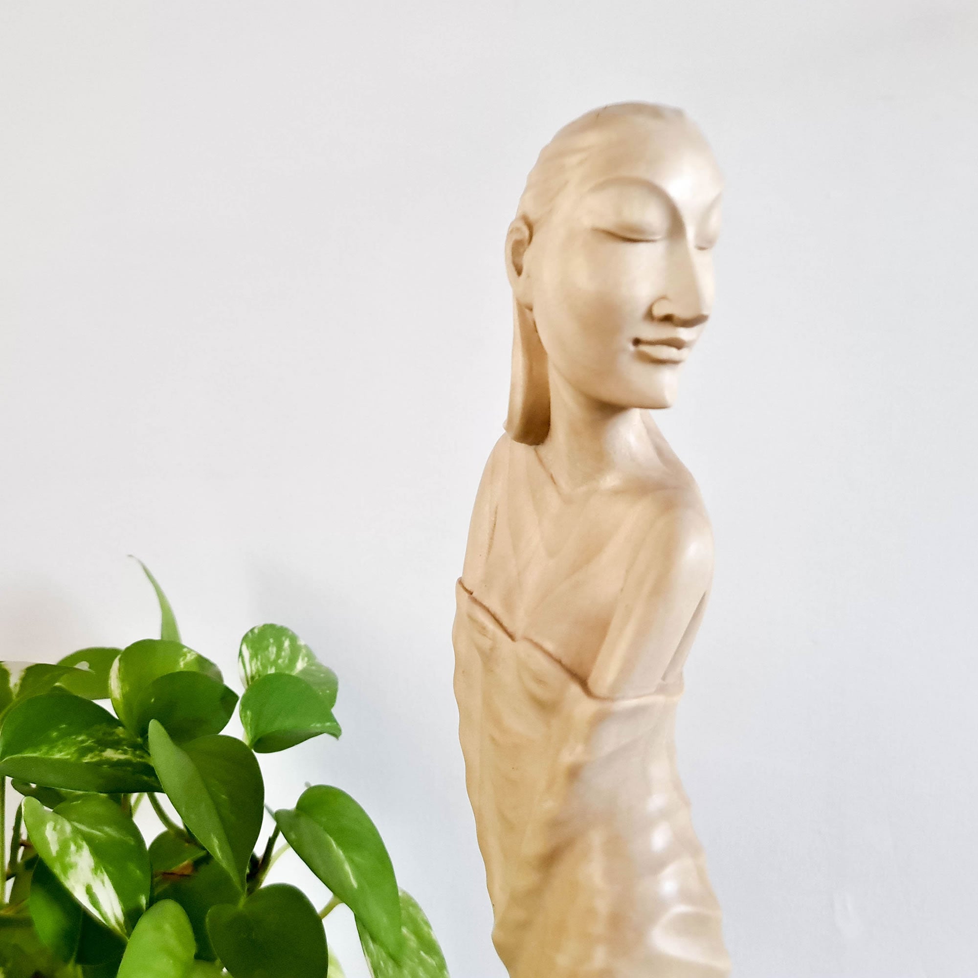 "Lady Chatterley" is a tale of repression, lust, and sexual liberation set in post-World War I France. This beautiful hand-carved sculpture has been hand-crafted by our skilled carvers using the rarest tulip white wood. Its intricate carving is detailed to perfection and is a true masterpiece to grace any interior space. It certainly can be used as a unique gift for a loved one to express your deeper love.