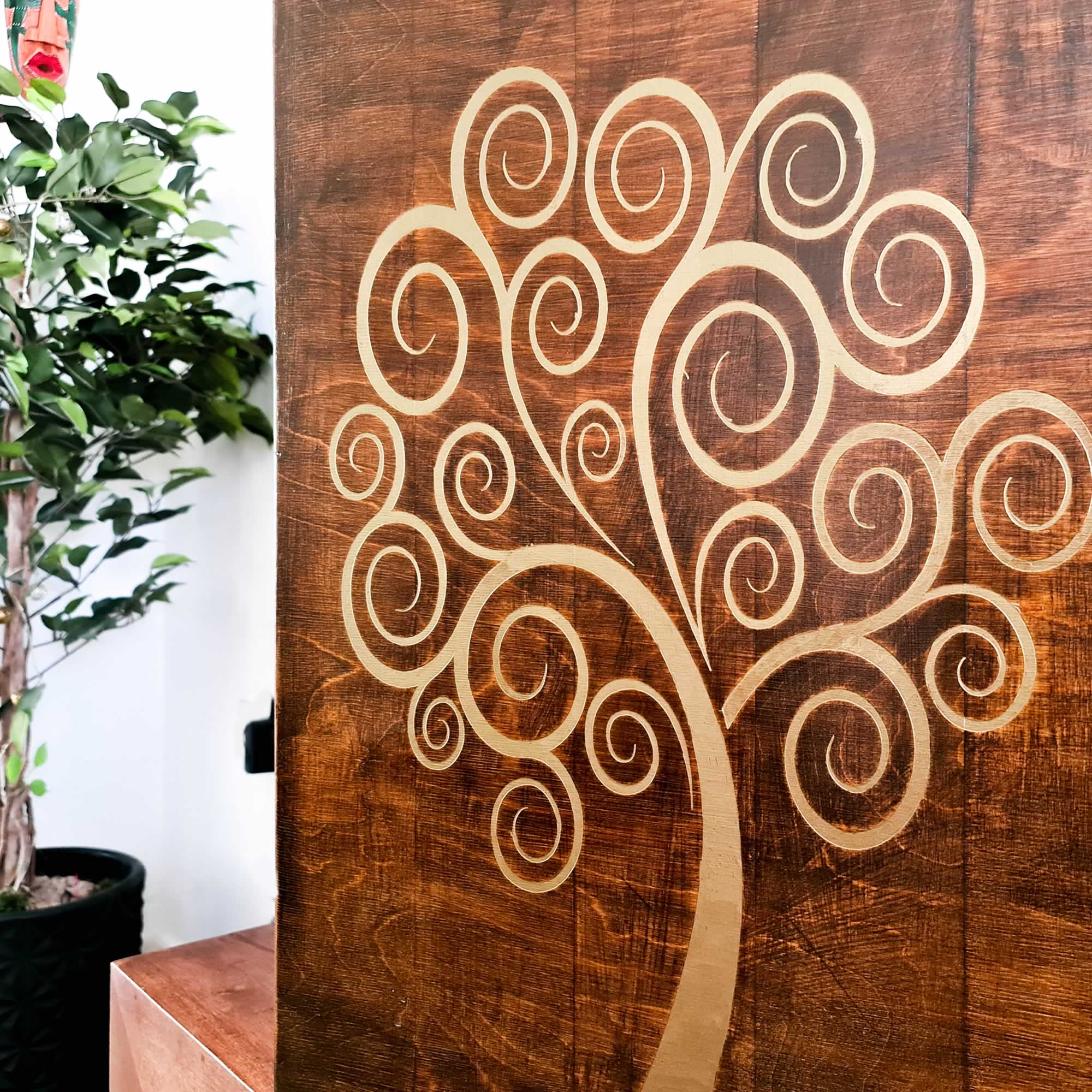 The Golden Tree of Life is a stunning piece of wooden decorative wall art, meticulously handcrafted by artisans.