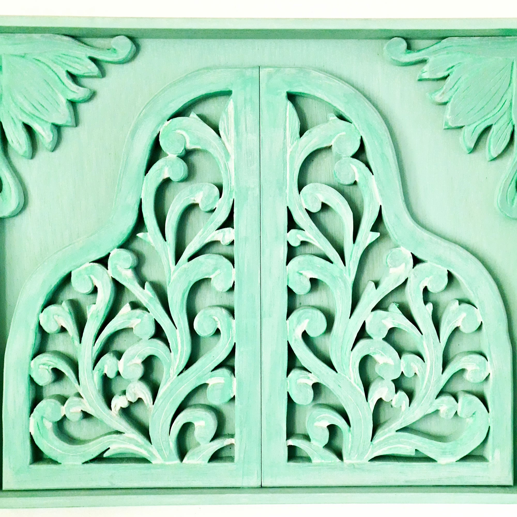 Truly remarkable, this unique piece of Carved Wooden Wall Art is handcrafted and hand-painted, yielding eye-catching results. This Wall Art is sure to make a striking statement in any décor. Bohemian-styled distressed wall art.