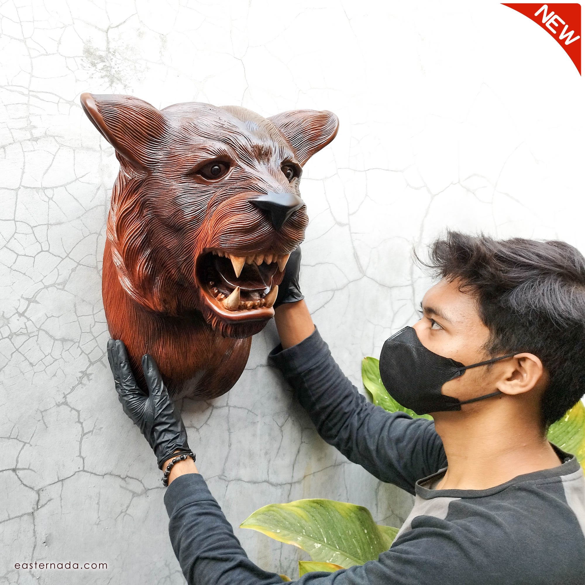 This stunning large hand-carved teakwood decorative African Tiger Lion head wall sculpture is simply amazing. Carved out of solid wood by hand with intricate details. This certainly will be an eye-catching feature in any room and a talking point.