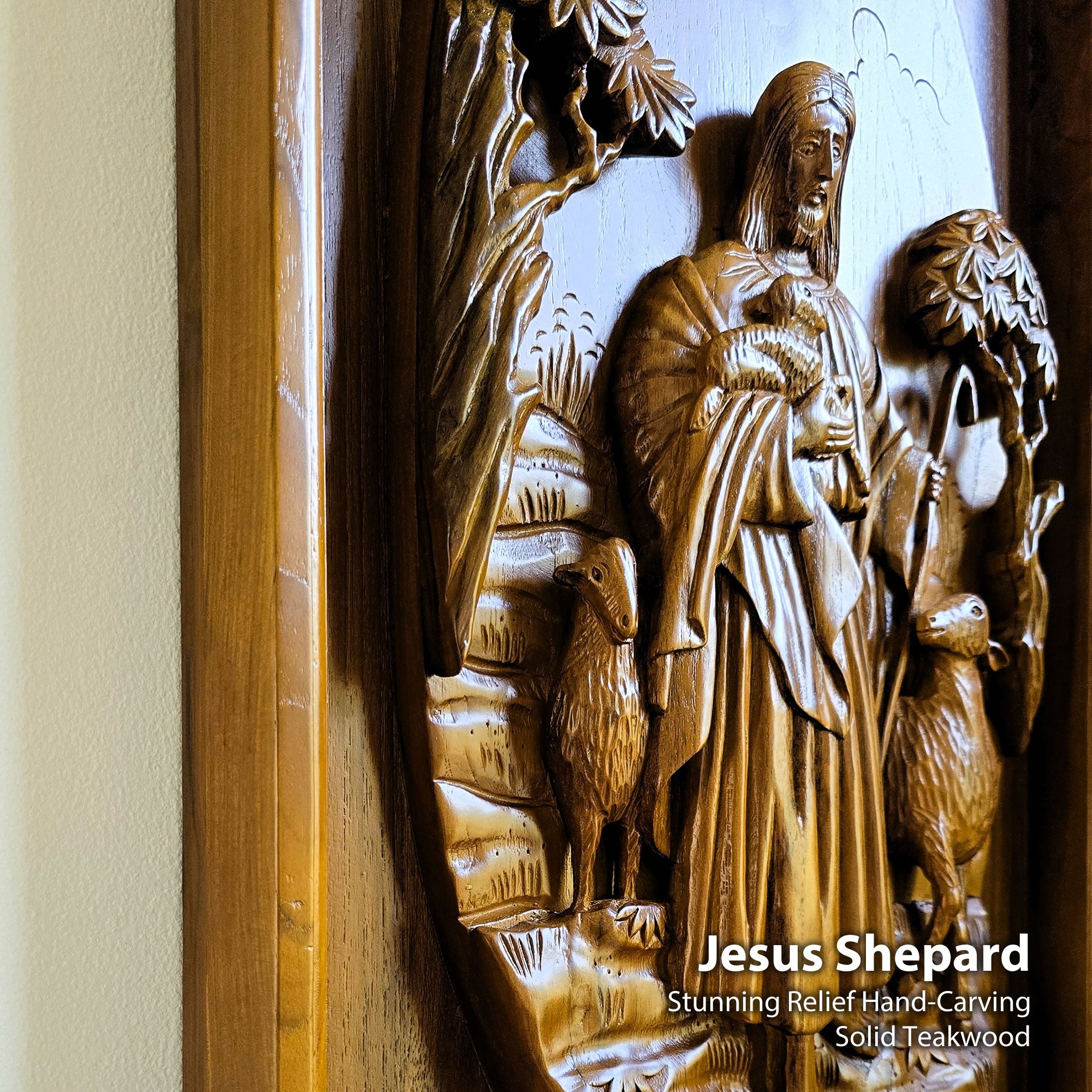 Detailed closeup of solid teak wood carving showing dimensional relief details of Jesus Christ as the sacred shepherd, hand-crafted wall sculpture.