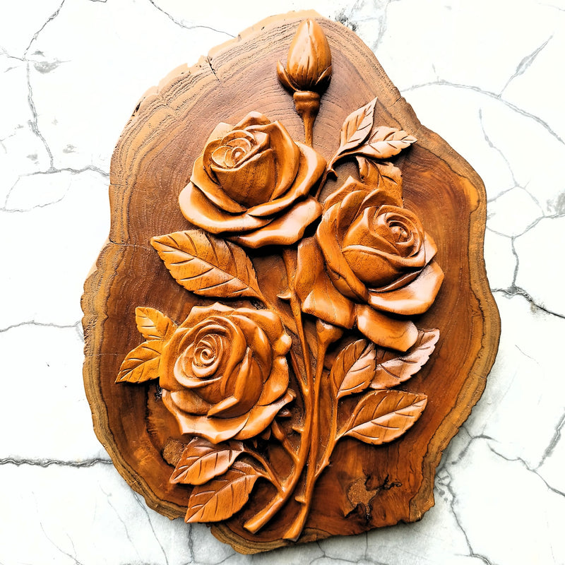 Front view of a hand-carved solid teakwood rose bouquet wall art, showing intricate floral detailing and the natural wood grain of the 40cm sculpture