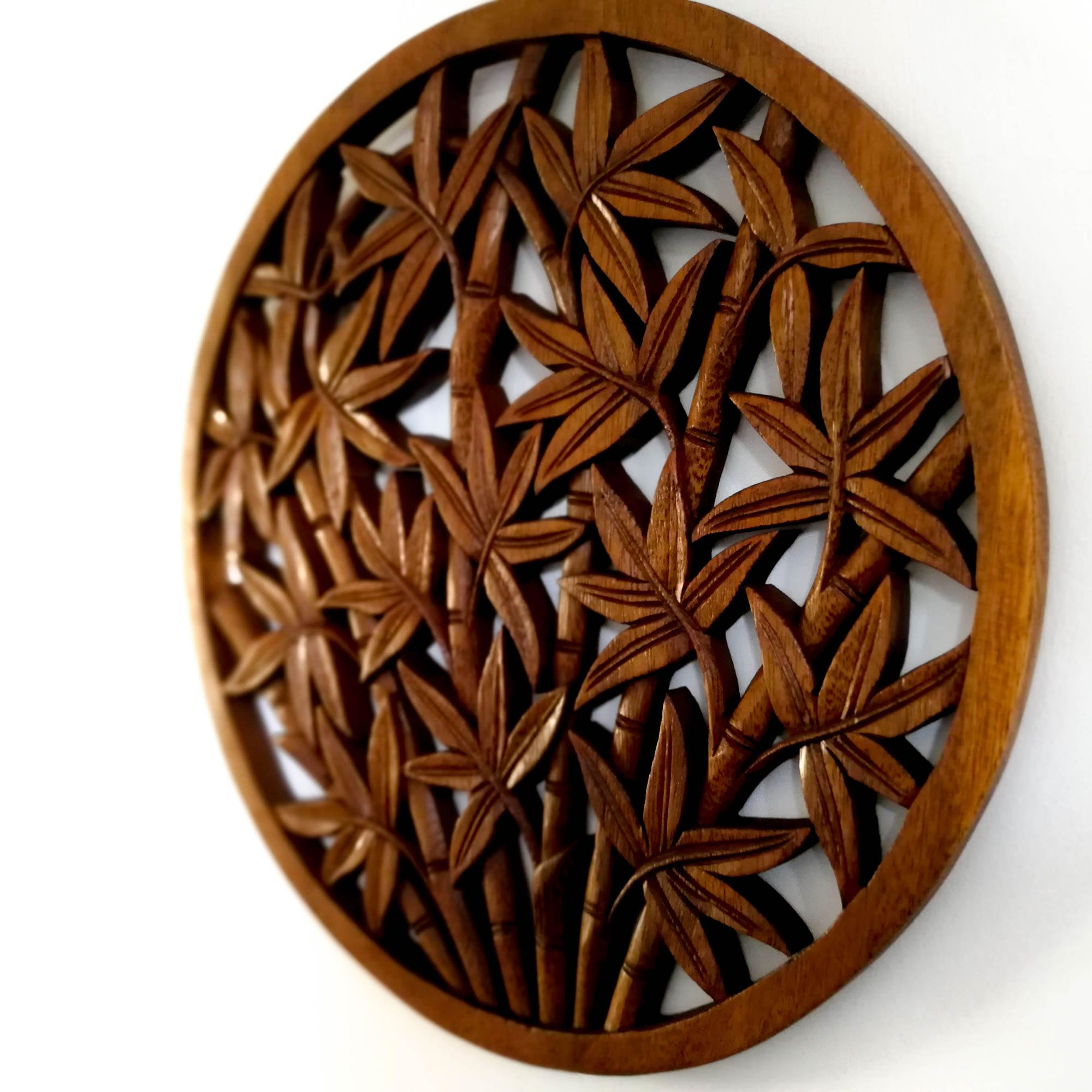 Hand Carved Wooden Decorative Wall Art Round - Bamboo Shoots. A perfect gift this season. Handmade using teak wood.