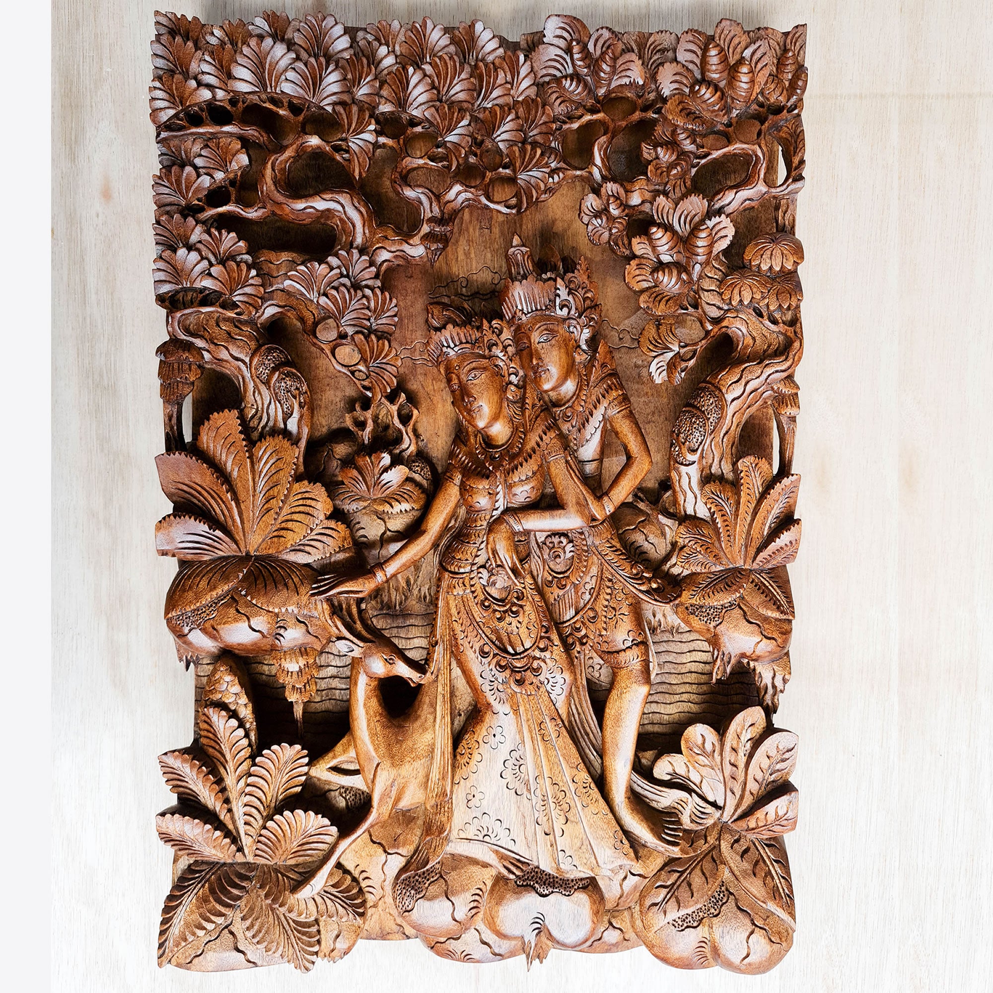 Radha Krishna in Vrindavan Carved Decorative Wall Art Sculpture. This is a stunning timeless masterpiece with intricate carving and details. A must for display in Hindu Pooja Prayer Mandir or on any room wall. This can be a perfect gift to a loved one - Easternada