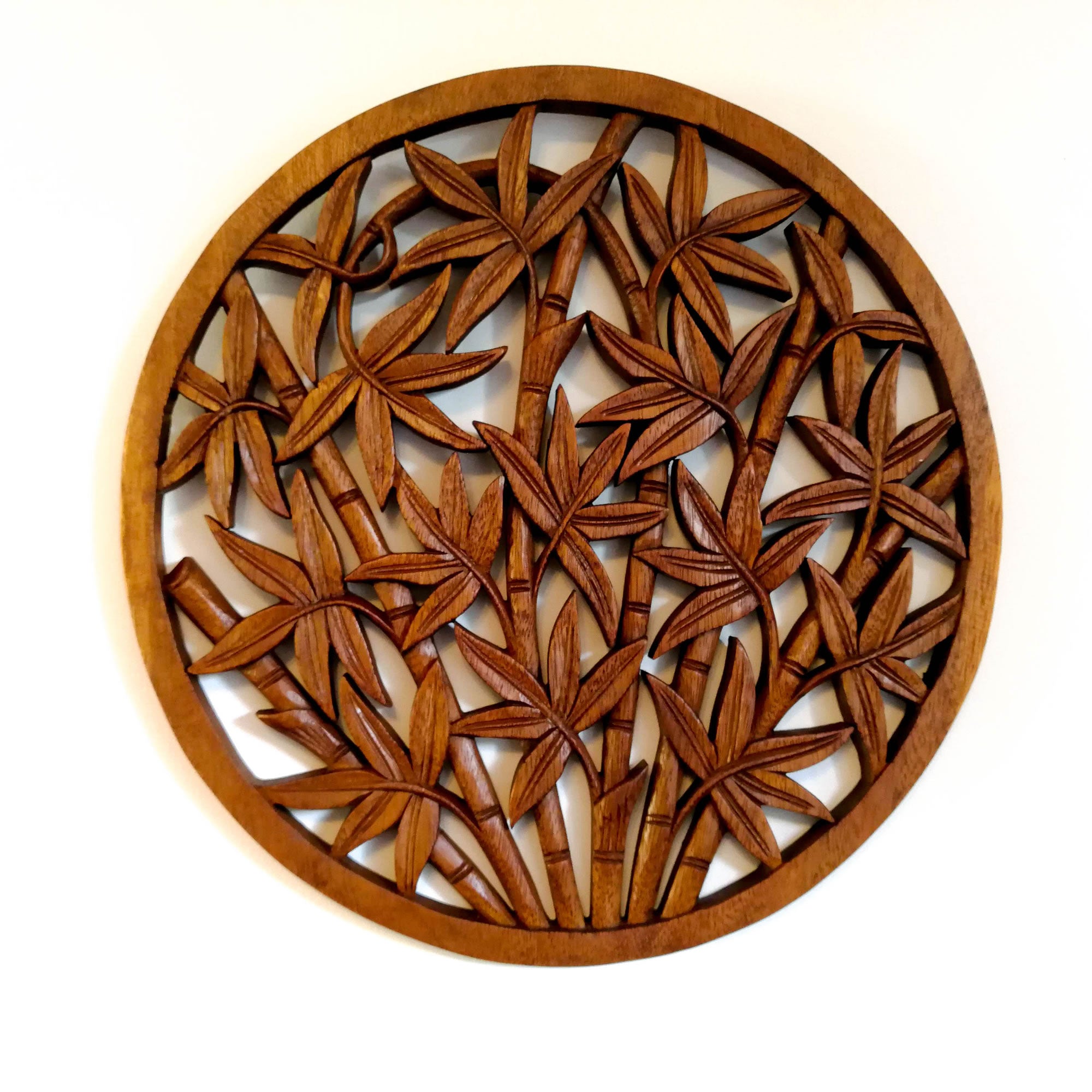 Hand Carved Wooden Decorative Wall Art Round - Bamboo Shoots. A perfect gift this season. Handmade using teak wood.