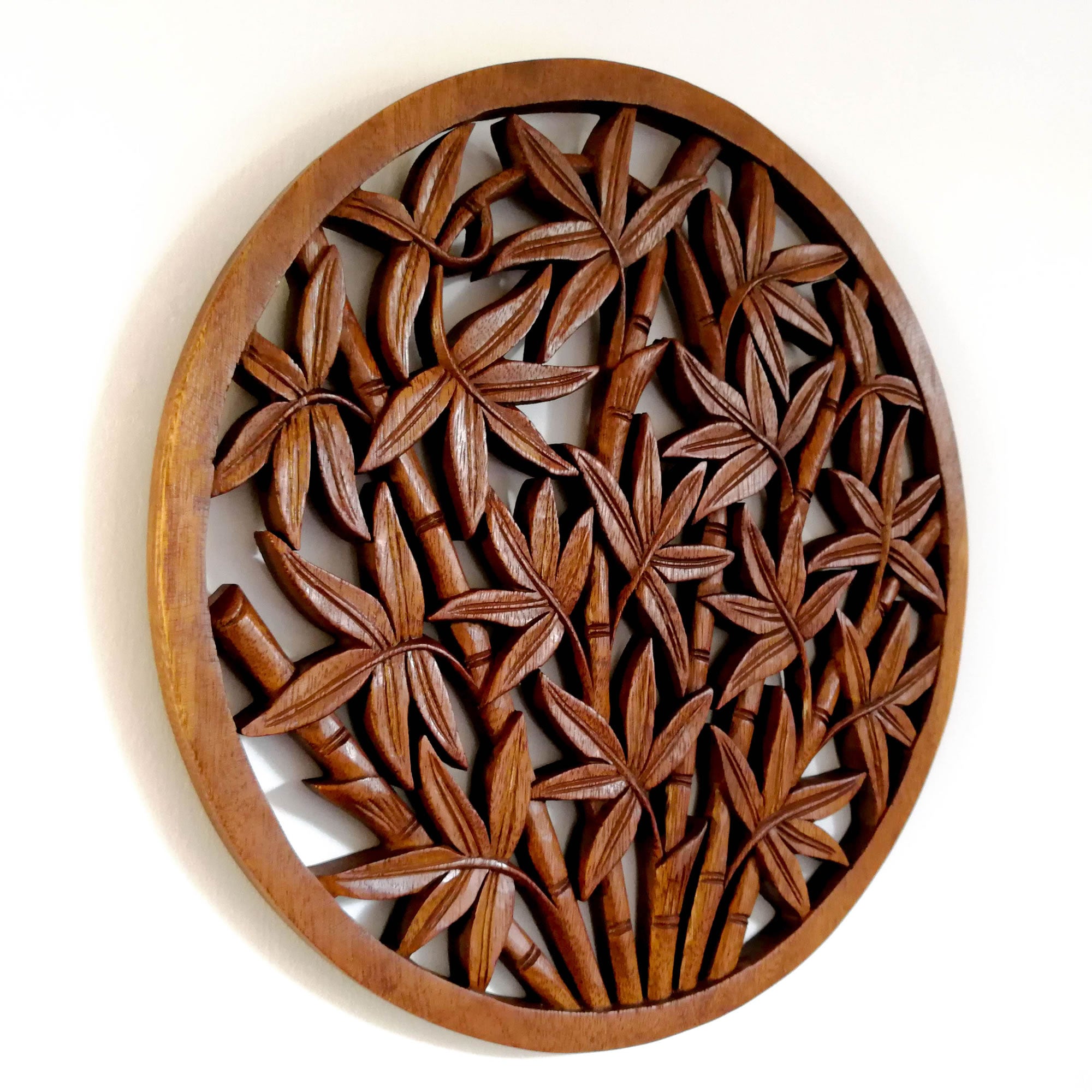 Hand Carved Wooden Decorative Wall Art Round - Bamboo Shoots. A perfect gift this season. Handmade using teak wood.