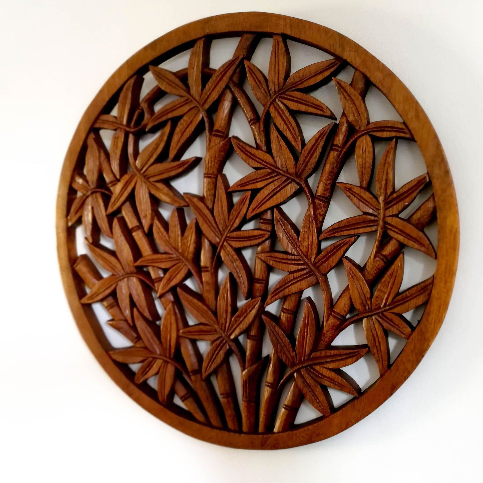 Hand Carved Wooden Decorative Wall Art Round - Bamboo Shoots. A perfect gift this season. Handmade using teak wood.