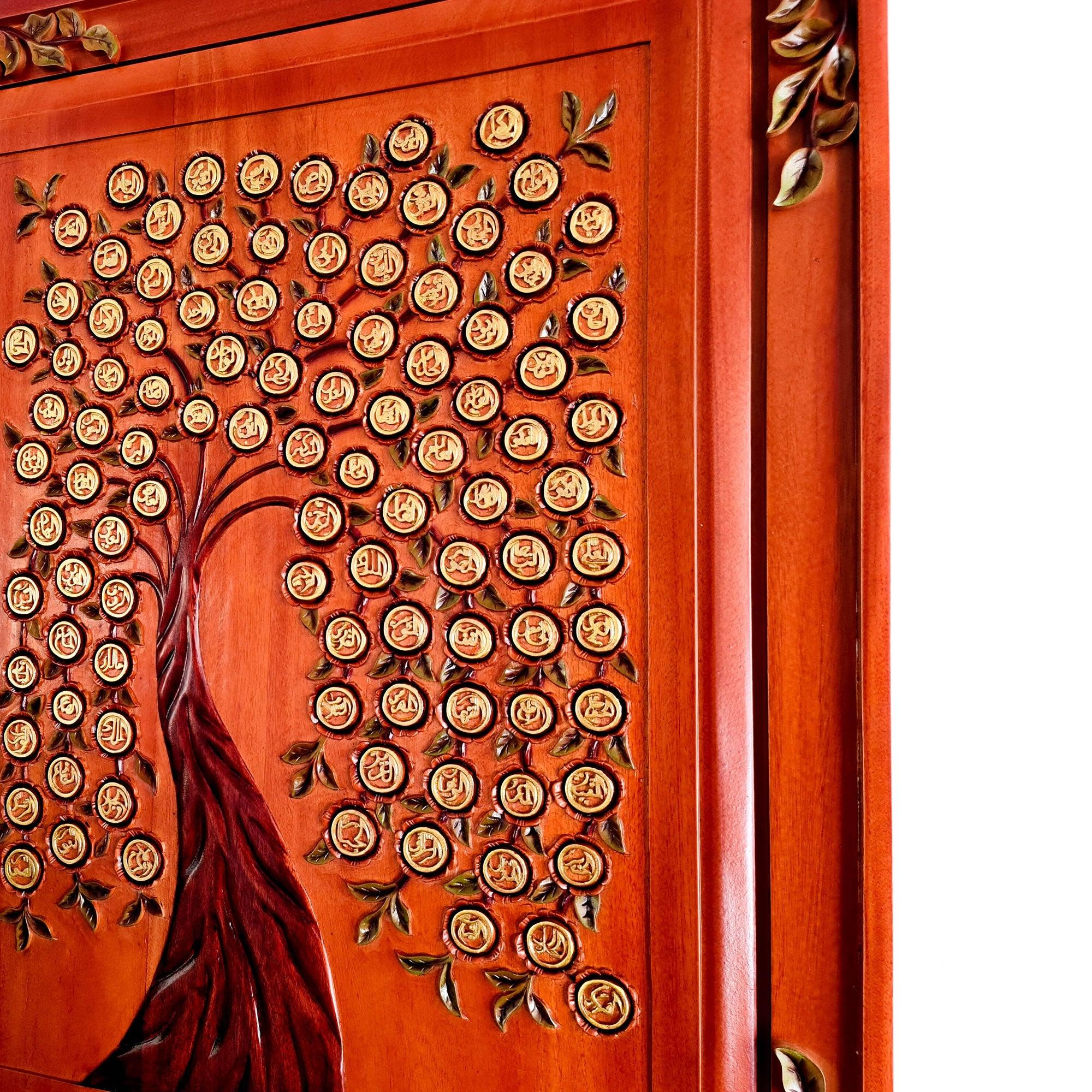 Monumental Asmaullah il Husna Tree of Life wall art installed in a luxury living room; hand-carved teakwood Islamic calligraphy with hand-painted gold detail.