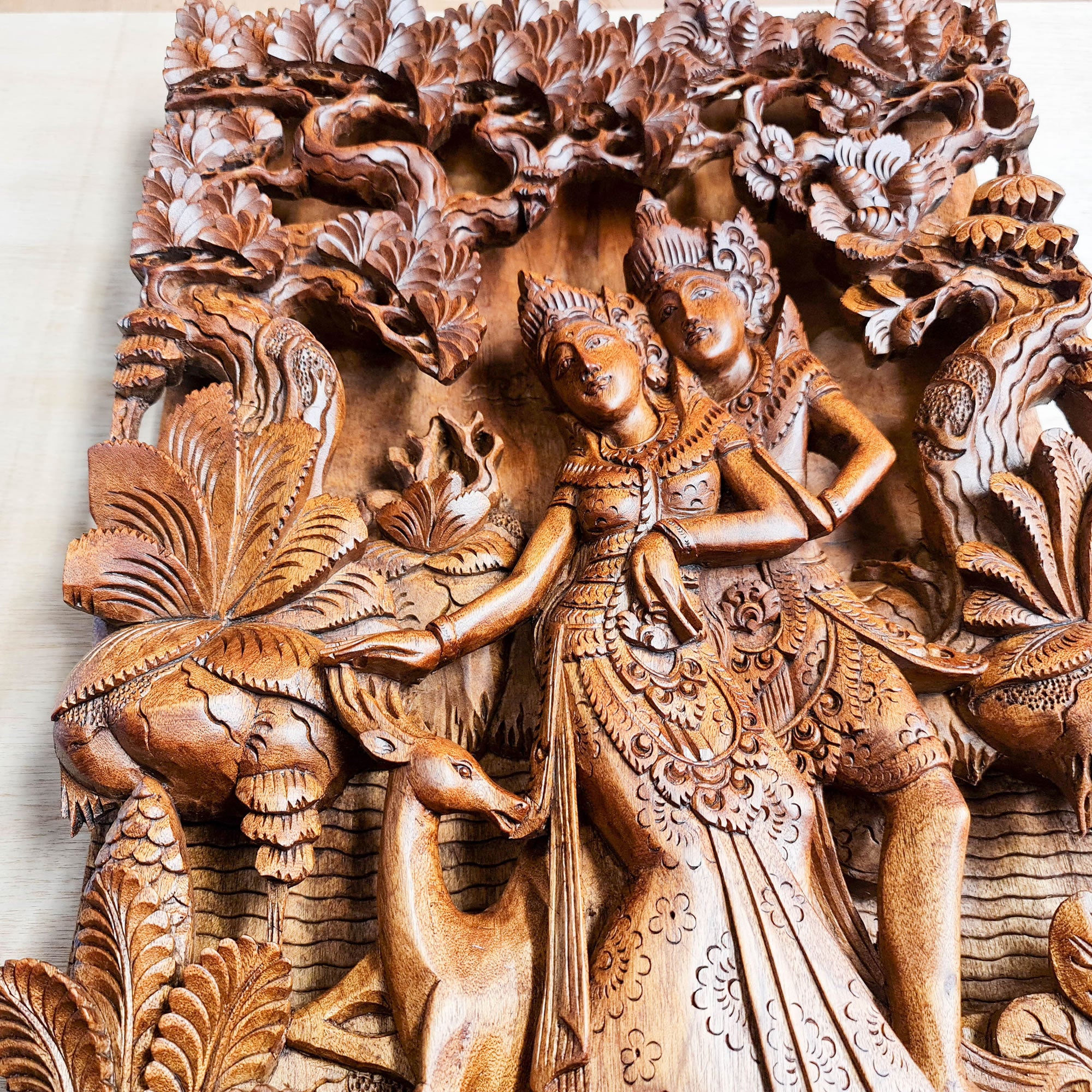 Radha Krishna in Vrindavan Carved Decorative Wall Art Sculpture. This is a stunning timeless masterpiece with intricate carving and details. A must for display in Hindu Pooja Prayer Mandir or on any room wall. This can be a perfect gift to a loved one - Easternada