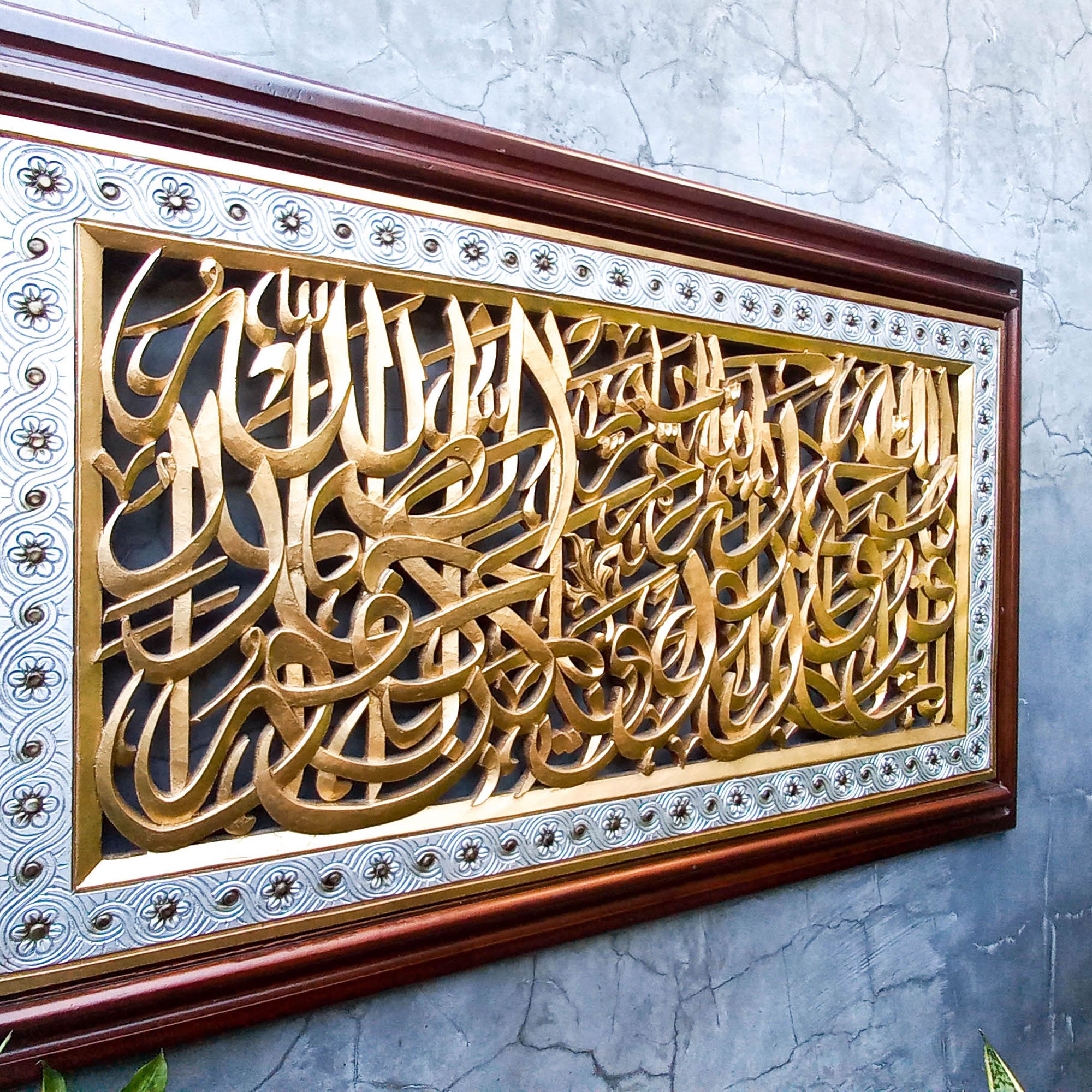 Introducing our Hand Carved Wooden Arabic Muslim Calligraphy Ayatul Kursi Large Panel - a truly stunning piece of wood art. This large carved framed panel Asmaullah il Husna is simply stunning with intricate detailing on teak wood.