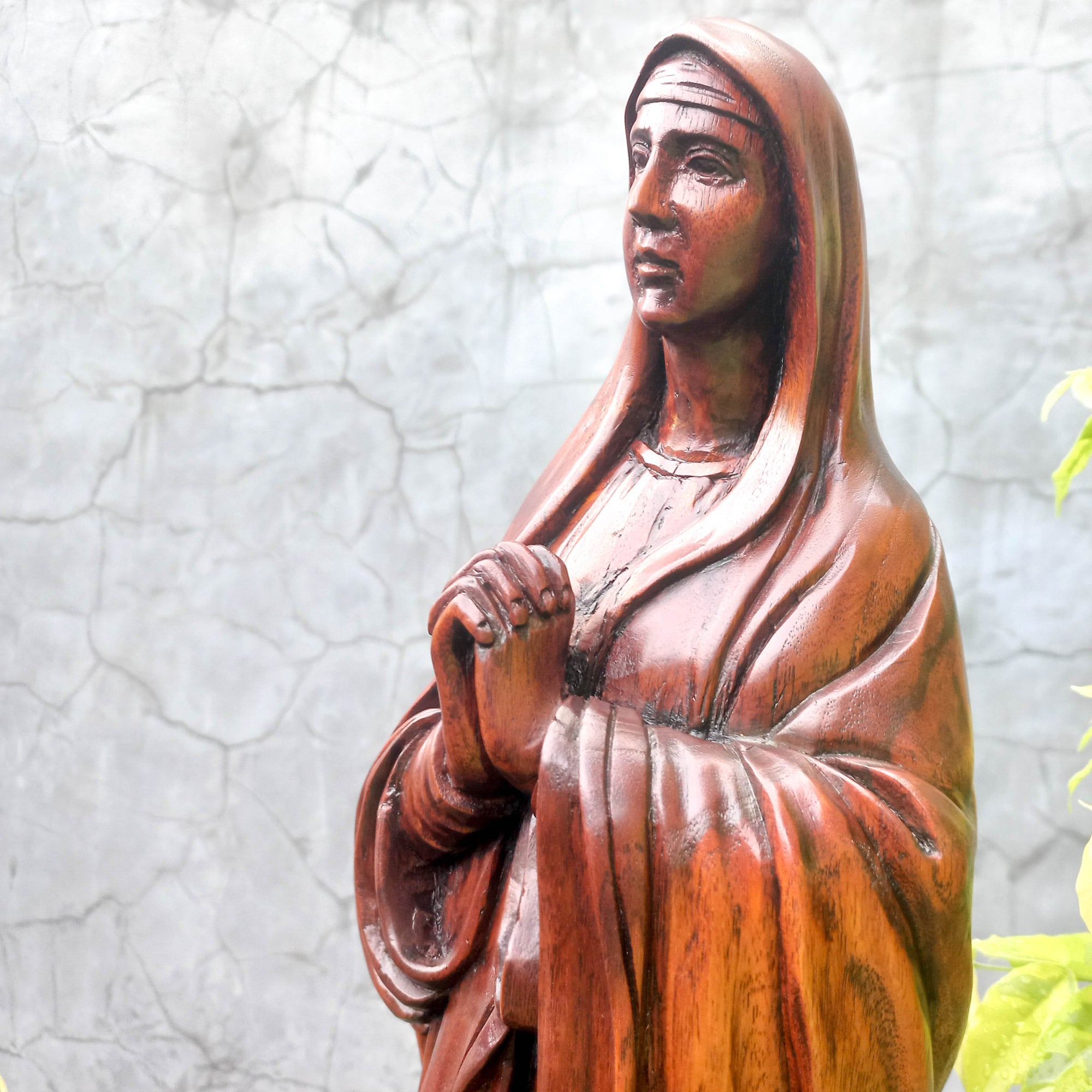 Hand-carved out of solid hardwood this sculpture is quite unique and rare. The image depicts the Virgin Mary with beautiful detail. A stunning Masterpiece. Bring home the blessings of Jesus and Mary. Gospel Christian Prayer. Bible. Easternada