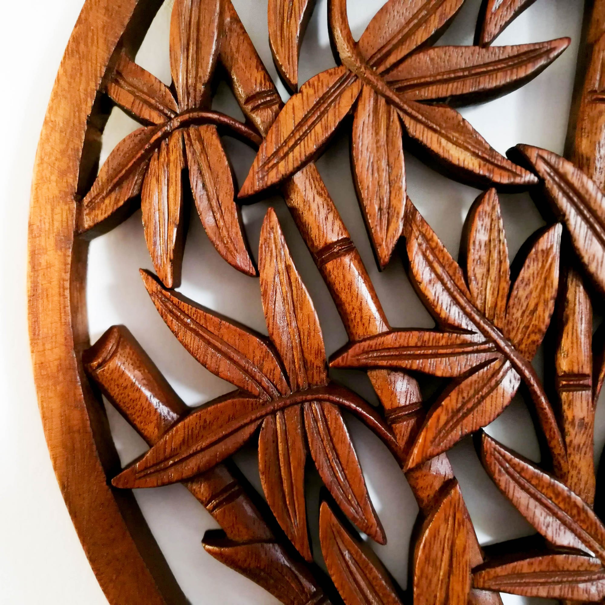 Hand Carved Wooden Decorative Wall Art Round - Bamboo Shoots. A perfect gift this season. Handmade using teak wood.