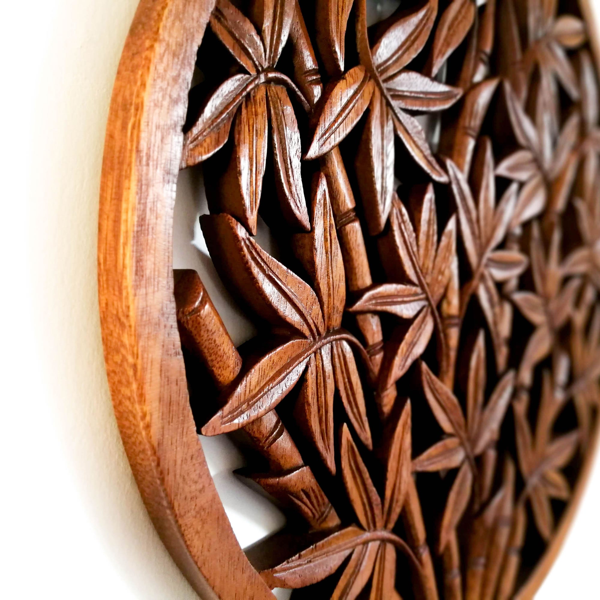 Hand Carved Wooden Decorative Wall Art Round - Bamboo Shoots. A perfect gift this season. Handmade using teak wood.