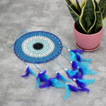 A beautiful Nazar Turkish Evil Eye Handmade Bohemian Macramé Beads Dream Catcher Car Wall Hanging Decoration Art, a perfect gift. A unique piece with subtle colors and beads to give an elegant touch