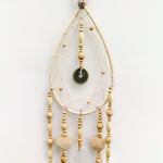 Bohemian Macrame Hanging Dream Catcher - EasternadaThis handmade dream catcher is a unique piece with real sea shells and wooden beads. Bohemian Style Handmade Decorative Hanging Macramé Dream Catcher