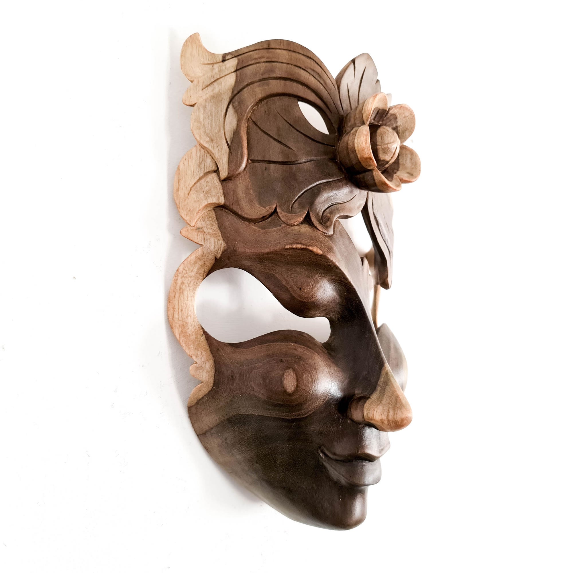 This beautiful hand-carved wooden African Venetian Mask is simply breathtaking. Carved with such detail and patience, this will certainly become a feature in any room. Perfect Gift
