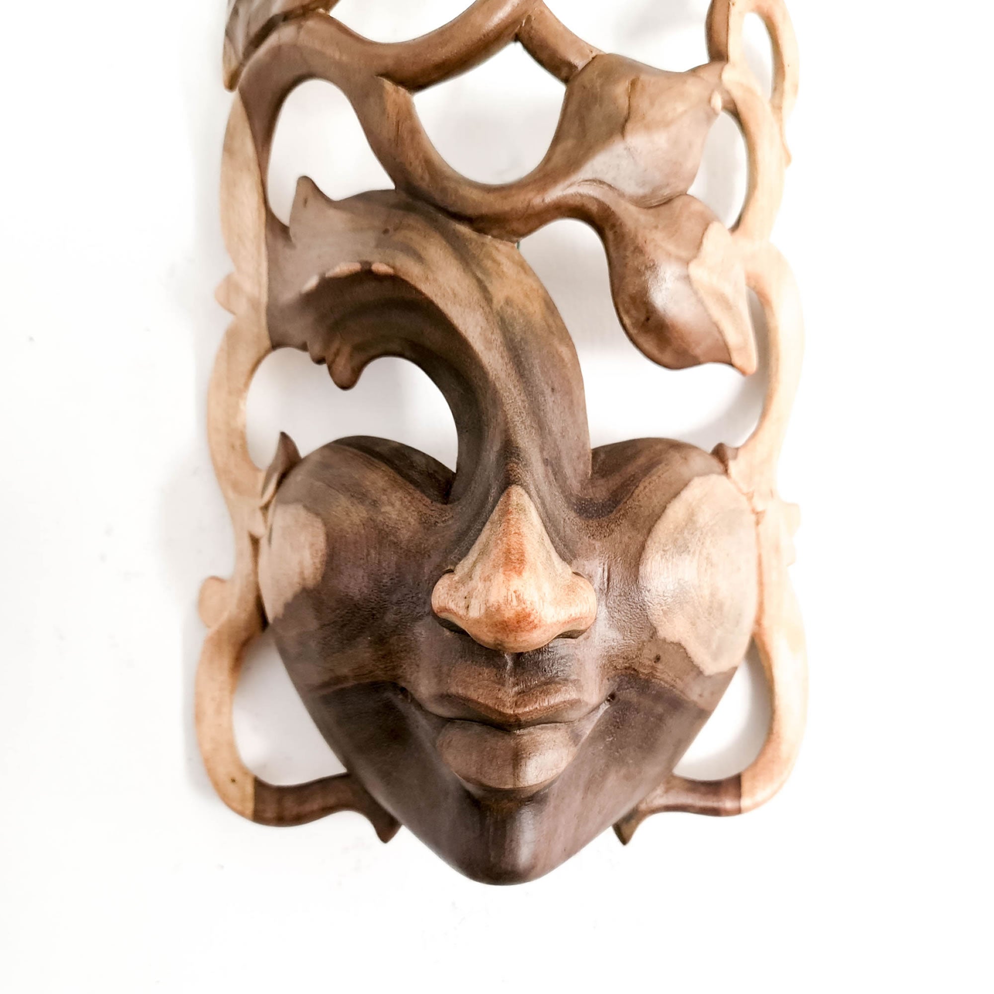 This beautiful hand-carved wooden African Venetian Mask is simply breathtaking. Carved with such detail and patience, this will certainly become a feature in any room. Perfect Gift