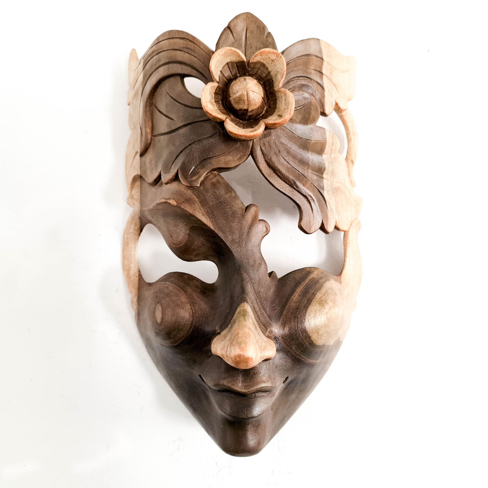 This beautiful hand-carved wooden African Venetian Mask is simply breathtaking. Carved with such detail and patience, this will certainly become a feature in any room. Perfect Gift
