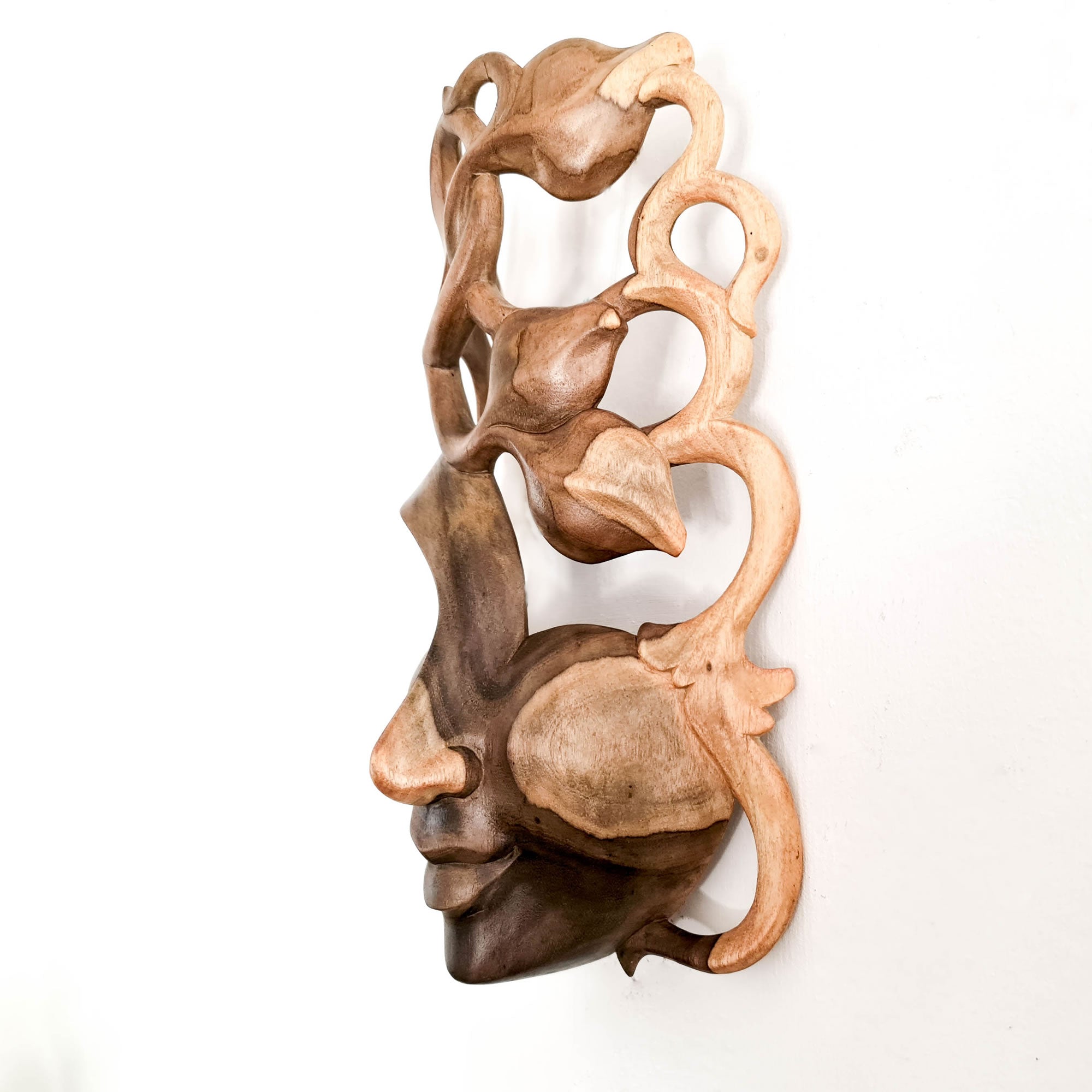 This beautiful hand-carved wooden African Venetian Mask is simply breathtaking. Carved with such detail and patience, this will certainly become a feature in any room. Perfect Gift