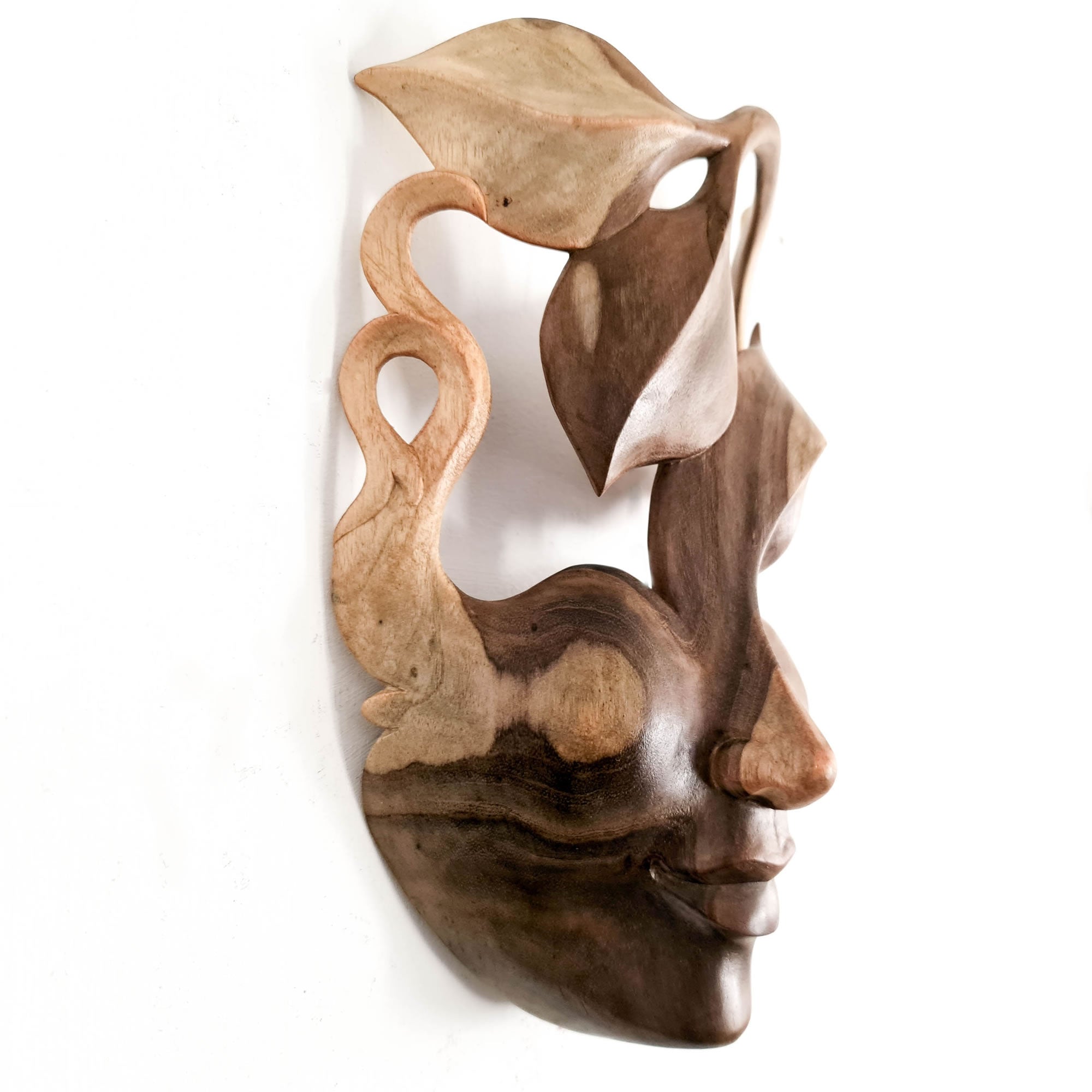 This beautiful hand-carved wooden African Venetian Mask is simply breathtaking. Carved with such detail and patience, this will certainly become a feature in any room. Perfect Gift