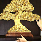 The Gilded Harmony Bonsai sculpture installed in a luxury living room; premium Feng Shui wall art by Easternada.