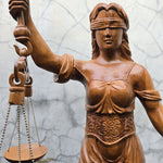 Hand-carved out of solid teakwood, this Lady Justice Greek Goddess sculpture is unique and rare.
