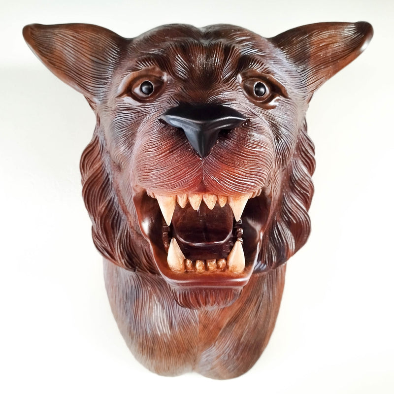 This stunning large hand-carved teakwood decorative African Tiger Lion head wall sculpture is simply amazing. Carved out of solid wood by hand with intricate details. This certainly will be an eye-catching feature in any room and a talking point. 