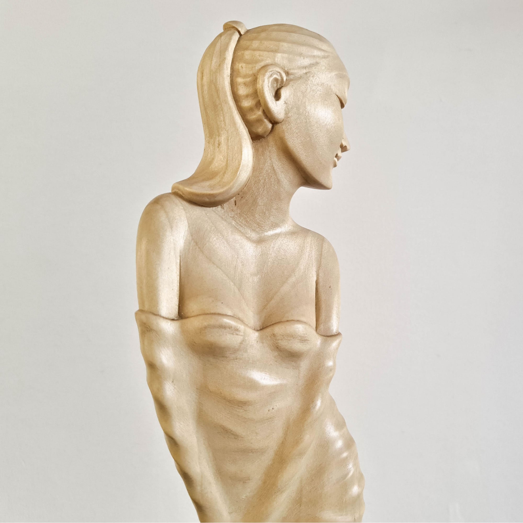 "Lady Chatterley" is a tale of repression, lust, and sexual liberation set in post-World War I France. This beautiful hand-carved sculpture has been hand-crafted by our skilled carvers using the rarest tulip white wood. Its intricate carving is detailed to perfection and is a true masterpiece to grace any interior space. It certainly can be used as a unique gift for a loved one to express your deeper love.