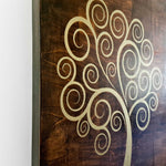 The Golden Tree of Life is a stunning piece of wooden decorative wall art, meticulously handcrafted by artisans. 