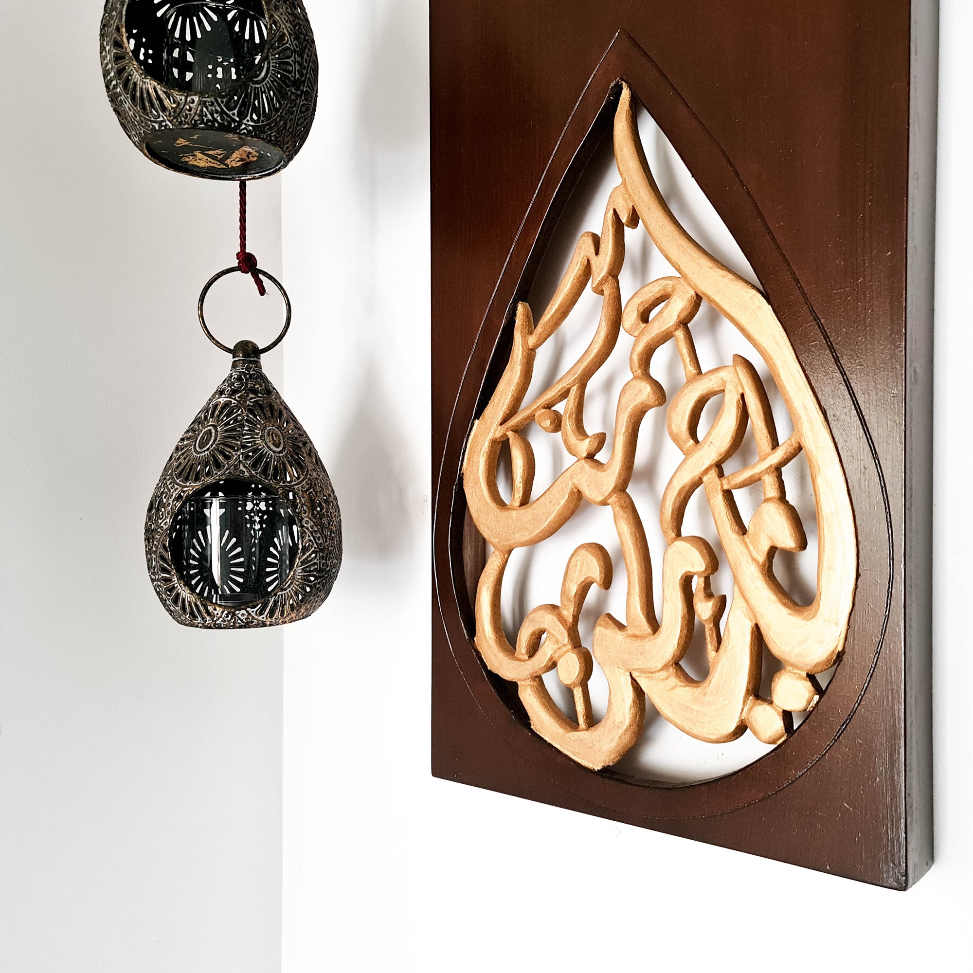 A stunning hand-carved wooden decorative wall art inspired by Islamic Arabic Calligraphy. A beauty to add to your interior walls to add a touch of elegance.