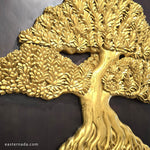 Close-up of hand-painted gold calligraphy-style branches on a 3D teakwood carving; showcasing high-relief artisan detail
