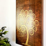 The Golden Tree of Life is a stunning piece of wooden decorative wall art, meticulously handcrafted by artisans. 