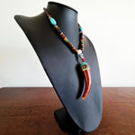 A bohemian style beautiful handmade tooth necklace for boys and girls. A Unique Gift