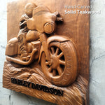 50cm square hand-carved solid teakwood wall art depicting a rider on a classic V-twin motorcycle