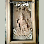 This is one of our exclusive collections of hand-carved wooden wall art sculptures, passionately carved by one of our trained carvers. Hindu Goddess of Wealth & Prosperity Ma Laxmi