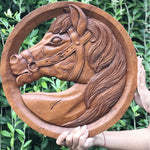 stunning large hand carved wooden Horse is simply amazing. Carved out of solid teak wood by hand with intricate details. This certainly will be an eye catching feature in any room and a talking point. A perfect gift this season.