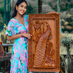 This is a stunning masterpiece. Intricate detailed hand carved Peacock birds out of Teak Wood. With decorative frame to match this will be the focal point in any room. Only one piece carved and its an exclusive and unique collection. A Perfect Gift - Easternada