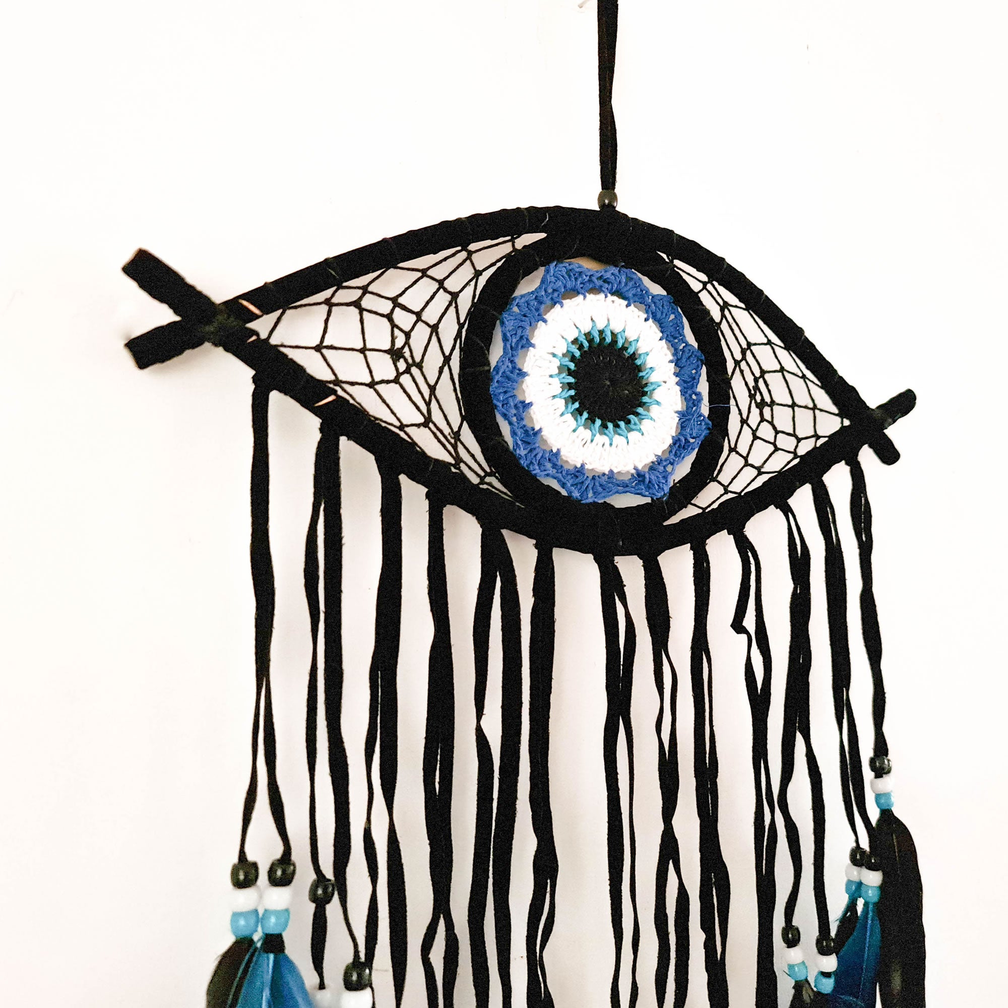 A beautiful Nazar Turkish Evil Eye Handmade Bohemian Macramé Beads Dream Catcher Car Wall Hanging Decoration Art, a perfect gift. A unique piece with subtle colors and beads to give an elegant touch.