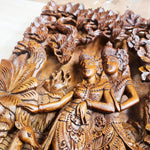 Radha Krishna in Vrindavan Carved Decorative Wall Art Sculpture. This is a stunning timeless masterpiece with intricate carving and details. A must for display in Hindu Pooja Prayer Mandir or on any room wall. This can be a perfect gift to a loved one - Easternada
